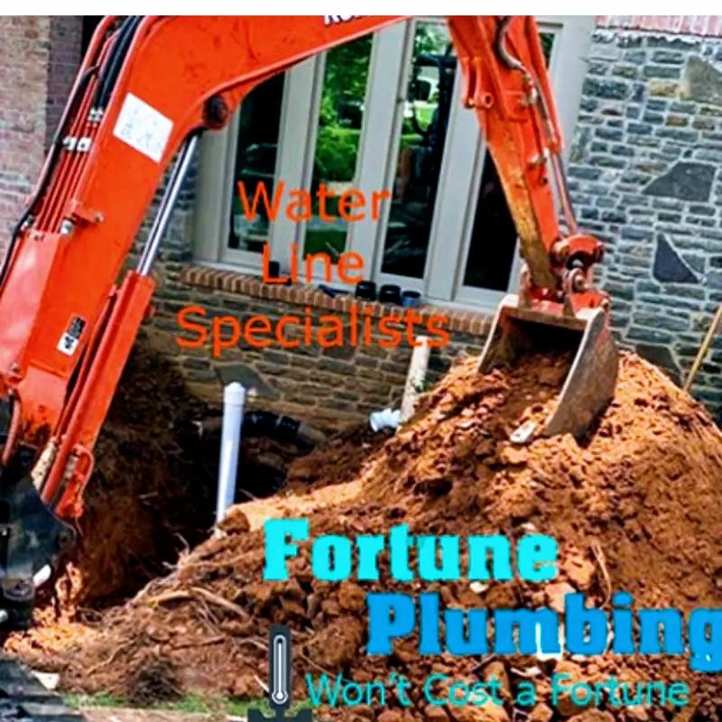 A Fortune Plumbing excavator part way through a water service line replacement
